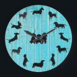 Turquoise Wooden Dachshund Silhouette Wall Clock<br><div class="desc">A beautiful creation with the serious dachshund lover in mind. This wall clock is a distressed faux wooden back round with adorable black doxie silhouettes making up each hour or the day. Includes long hair, wire hair and smooth coat dachshunds. This design can be put on hundreds of different back...</div>