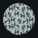 Tuxedo Black and White Cats Magnet<br><div class="desc">Cute black and white tuxedo cats going about their business. A fun pattern on a mid blue background.</div>