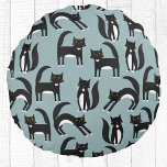 Tuxedo Black and White Cats Round Cushion<br><div class="desc">Cute black and white tuxedo cats going about their business. A fun pattern on a mid blue background.</div>