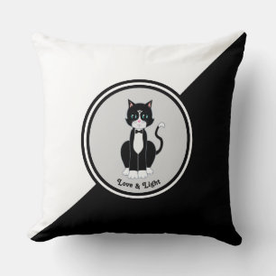 Tuxedo Cat on Black and White Cushion