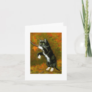 Tuxedo Cat Playing with Leaves Note Card