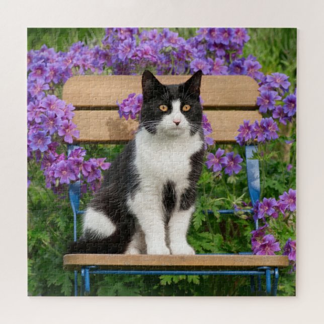 Tuxedo cat sitting on a garden chair with flowers jigsaw puzzle (Horizontal)