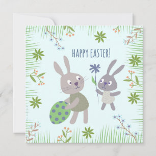 Twee paashaasjes met ei en bloem. card