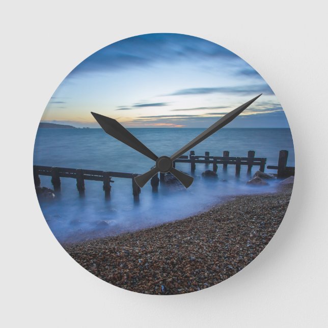 Twilight Sky Over Shoreline and Breakwaters Round Clock (Front)