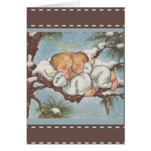 Twin Cherub Angels sleeping in snow bough branchs