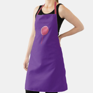 Twirled pink lollipop with red apron