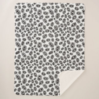 Twirly eyes white sherpa blanket