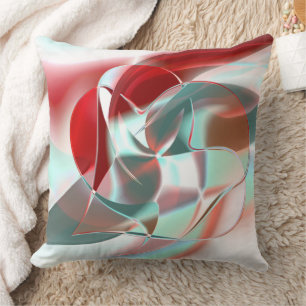 Twisted circular pieces in soft red coral to grey  cushion