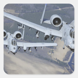 Two A-10C Thunderbolt II aircraft fly in format Square Sticker