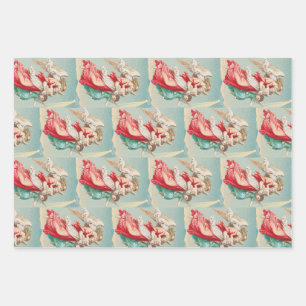 Two angels wear a small child wrapping paper sheet