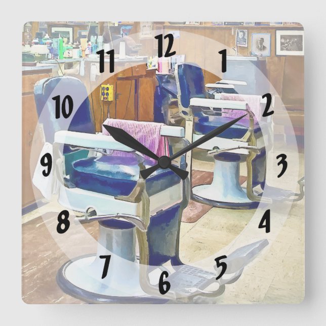 Two Barber Chairs With Pink Striped Barber Capes Square Wall Clock (Front)