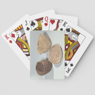 Two baskets and a cover (woven palm fronds) playing cards