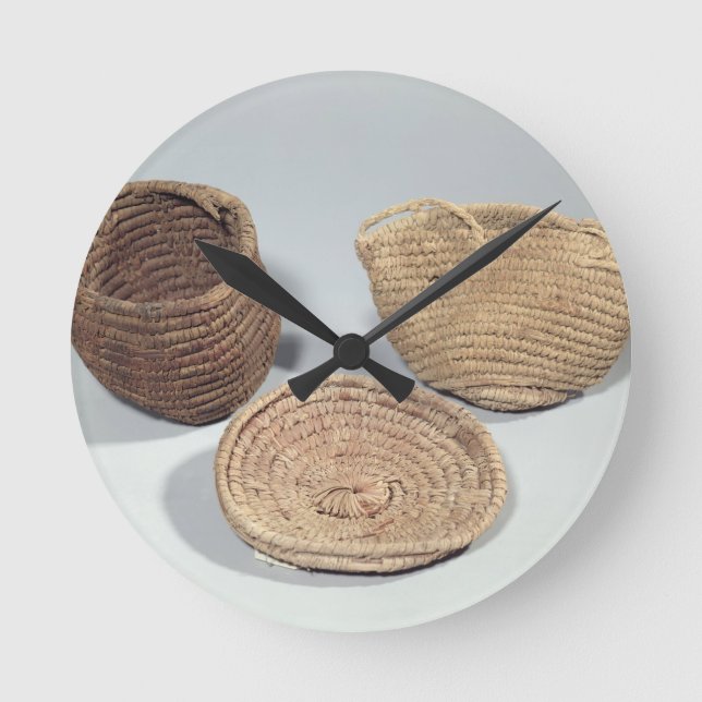 Two baskets and a cover (woven palm fronds) round clock (Front)