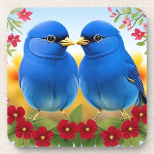 Two Blue Birds Perched Among Colourful Blossom Coaster