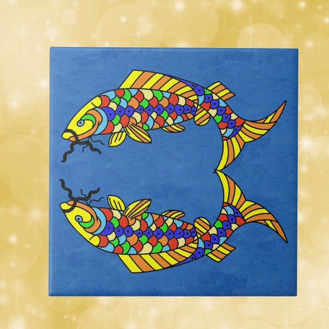 Two Bright Abstract Fancy fish on Deep Blue Ceramic Tile (Two fancy fish with scales in  bright bold multiple colours on dark blue decorative ceramic tile.)
