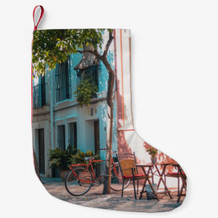 Two brown table outside small christmas stocking