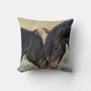Two Brown Wild Horses Nuzzling Cushion