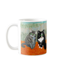 Two cats share your coffee break