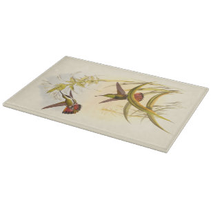 Two Colourful Hummingbirds Aiming for Same Flower Cutting Board