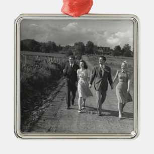 Two couples walking on country road B&W Metal Tree Decoration