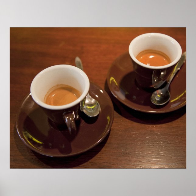 two cups of freshly brewed espresso coffee on a poster (Front)