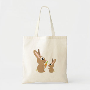 Two Cute Rabbits sharing a Carrot Tote Bag