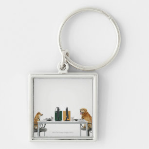 Two dogs wearing tie and glasses ,sitting on key ring