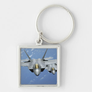 Two F-22 Raptors fly over the Pacific Ocean 2 Key Ring