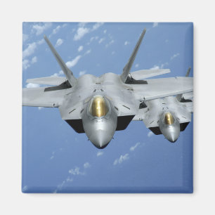 Two F-22 Raptors fly over the Pacific Ocean 2 Magnet