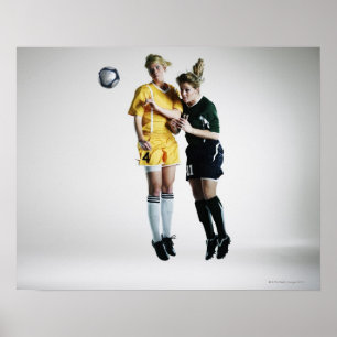 Two female soccer players in mid air heading poster