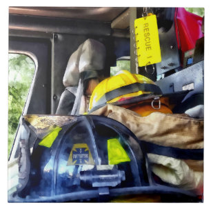 Two Firefighter's Helmets Inside Fire Truck Tile