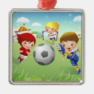 Two girls and a boy playing soccer metal tree decoration
