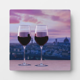 Two glasses of red wine on Florence skyline Plaque