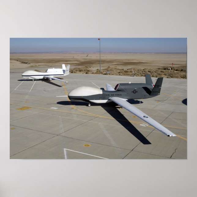 Two Global Hawks parked on a ramp Poster (Front)