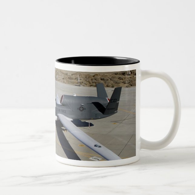 Two Global Hawks parked on a ramp Two-Tone Coffee Mug (Right)