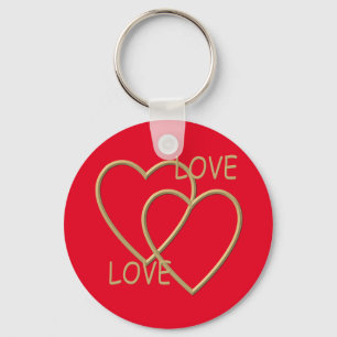 Two golden loving hearts key ring