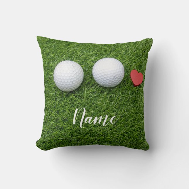Two Golf balls and  love heart are on green grass Cushion (Front)