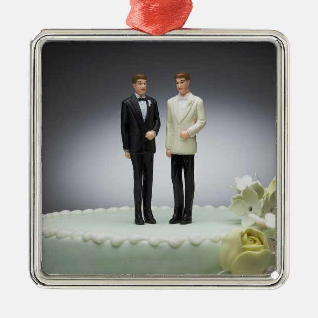 Two groom figurines on top of wedding cake metal ornament (Front)