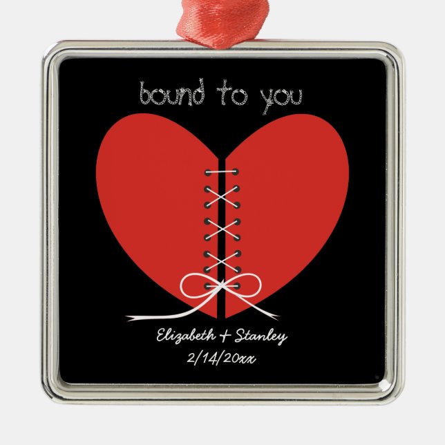 Two halves of a heart tied with a ribbon ornament (Front)