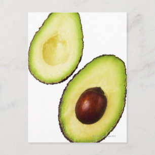 Two halves of an an avocado, on white postcard