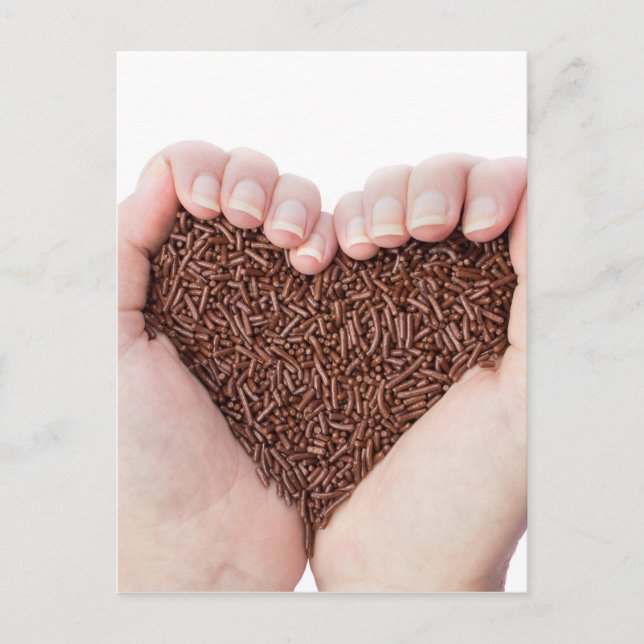 Two hands holding chocolate sprinkles postcard (Front)