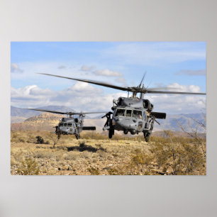 Two HH-60 Pavehawk helicopters preparing to lan Poster
