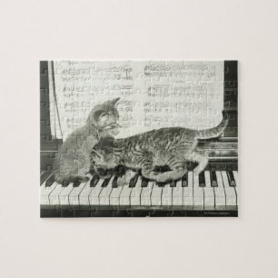 Two kitten playing on piano keyboard, (B&W) Jigsaw Puzzle