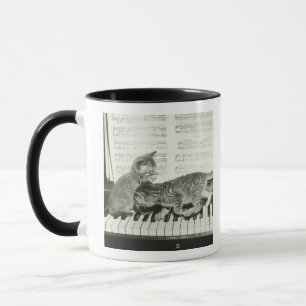 Two kitten playing on piano keyboard, (B&W) Mug