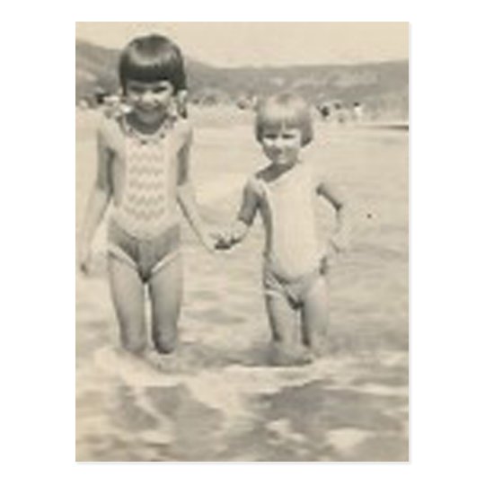 Two little girls holding hands sisters postcard