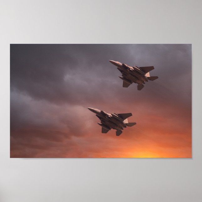 Two low flying F-15E Strike Eagles at sunset Poster (Front)