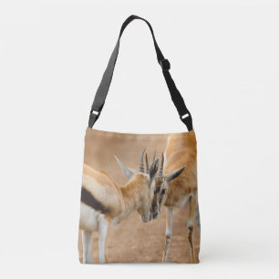 Two male impala fight. Africa, Serengeti Crossbody Bag