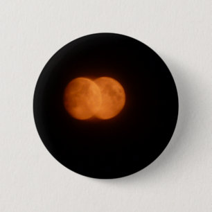 Two moons 6 cm round badge