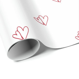 Two Open Red Hearts on White Wrapping Paper
