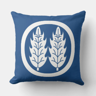Two parallel holly leaves in circle cushion
